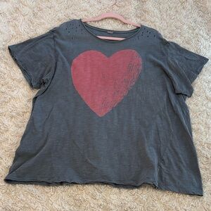 Magnolia Pearl Pink charming distressed pink heart tee in Ozzy. OS.
